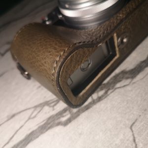 X100V half case with grip